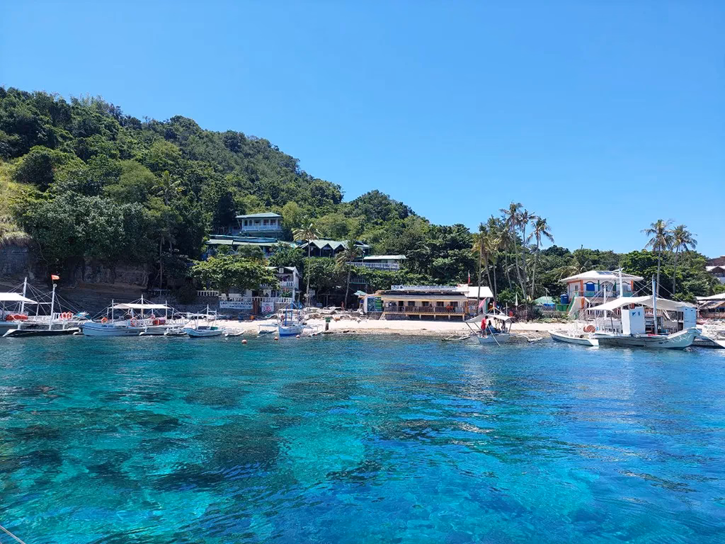 A picture from offshore of Apo Island on the side of Balay Reef.