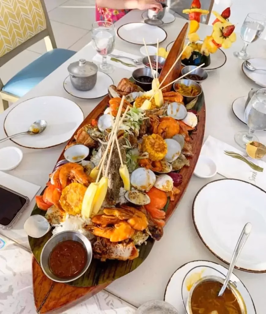This is a picture of a meal for a group in Boracay. The food is very nicely presented and looks delicious!