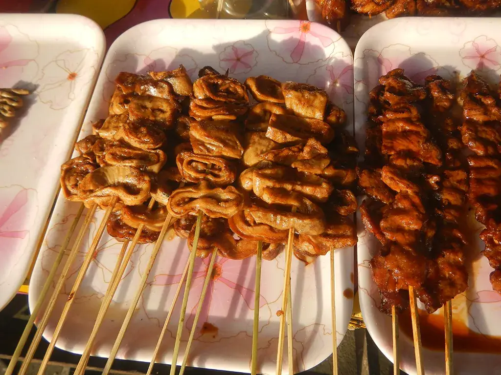 An example of Isaw - A Street Food a First-Time Visitor to the Philippines will likely encounter.