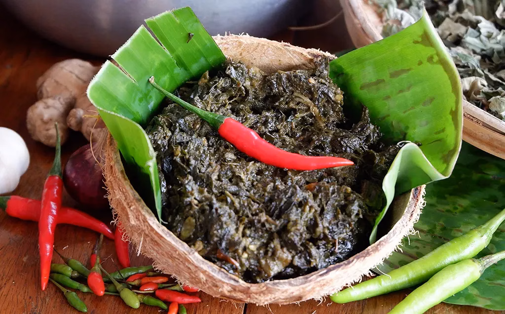 Here we have a less well know dish. This is Laing is a Bicolano dish made from dried taro leaves, coconut milk, chilies, ginger, garlic, and onion. It is often mixed with seafood or meat.