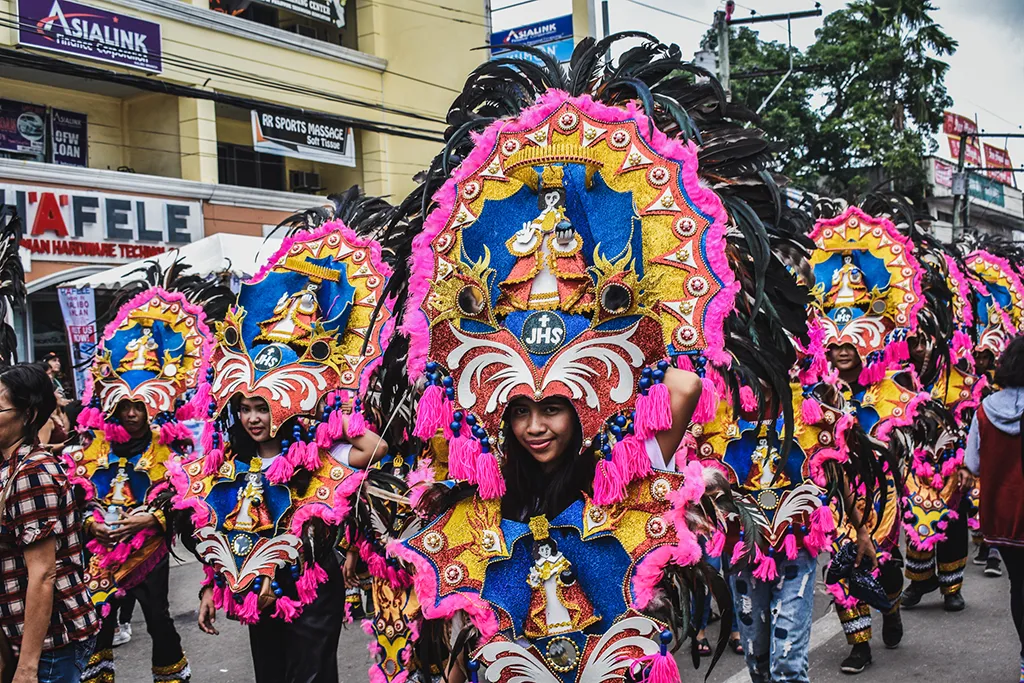 Parade-Goers in full costume at Kalibo Ati-Atihan Festival. These costumes are elaborate and very colorful!