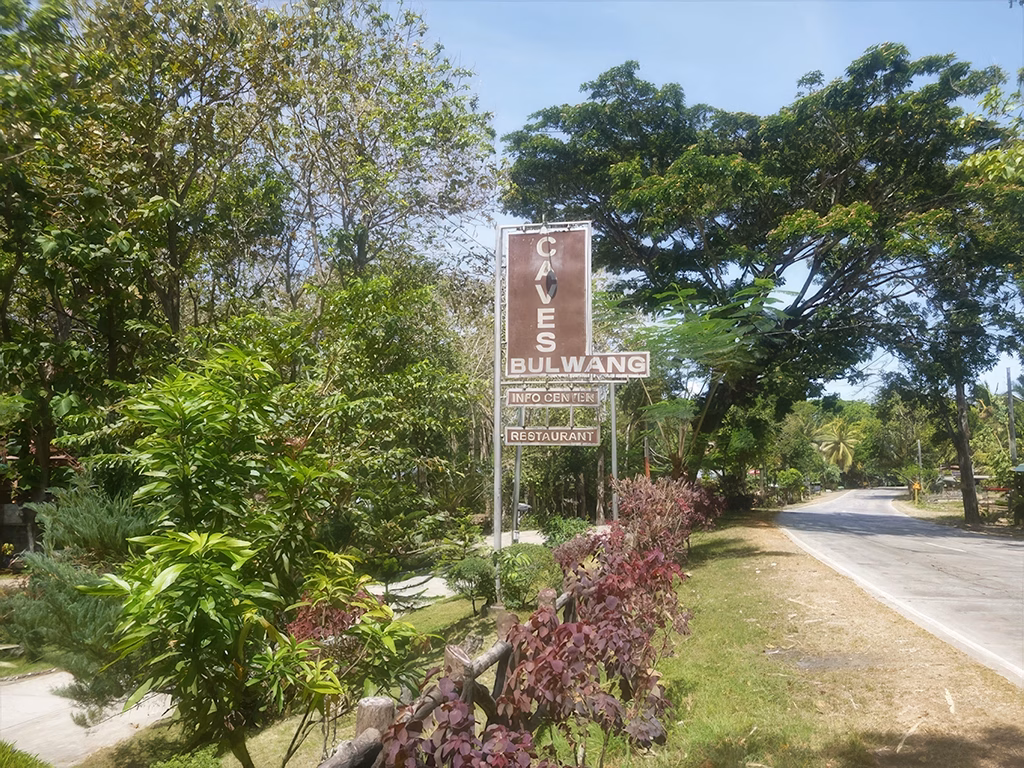 A sign on the road showing the entrance to the Bulwang Caves.